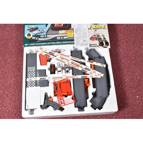 110 - A BOXED TCR ZIGZAG JAM RACEWAY 3 CAR SYSTEM ELECTRIC MODEL RACING TRACK, box in fair condition for a... 