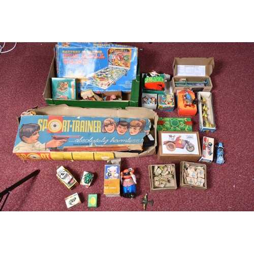 113 - A BOXED TECHNOFIX TINPLATE SPORT-TRAINER SHOOTING GALLERY TOY,  included in the box the whole fixed ... 