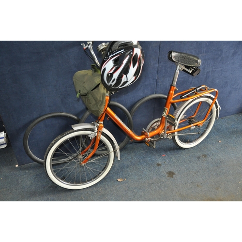 1051 - A HAWKS CYCLE FOLDING BICYCLE with 20in wheels and 16in frame in good condition along with a helmet ... 