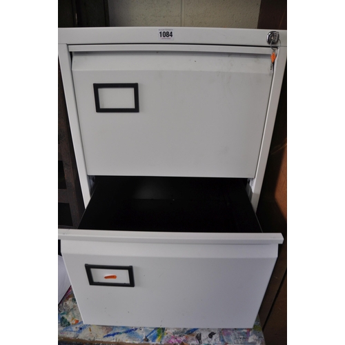 1084 - A DOUBLE DRAW FILING CABINET measuring width 48cm x depth 63cm x height 71cm with two keys