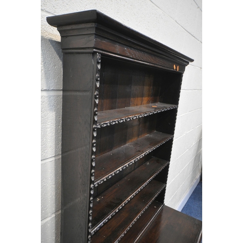 1207 - A OAK DRESSER INCORPORATING 18TH CENTURY OR EARLIER TIMBERS, the oak top with five open shelves over... 