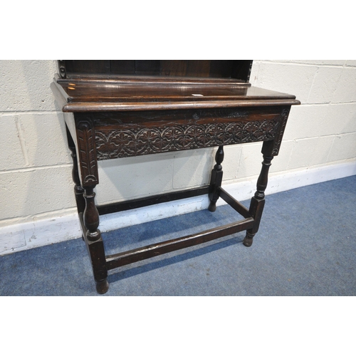 1207 - A OAK DRESSER INCORPORATING 18TH CENTURY OR EARLIER TIMBERS, the oak top with five open shelves over... 