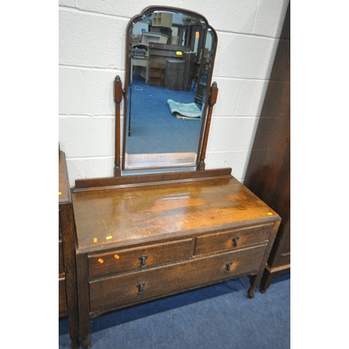 1208 - AN EARLY 20TH CENTURY OAK BEDROOM SUITE, comprising a single mirror door wardrobe width 118cm x dept... 