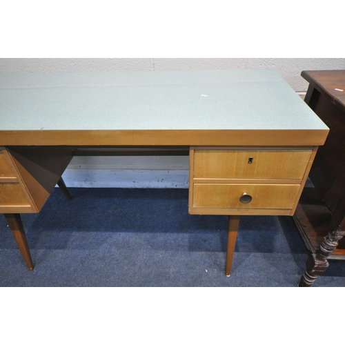 1219 - A MID CENTURY GREEN FORMICA TOPPED AND TEAK DESK, possibly by Ekawerk Horn Lippe of Germany, with fo... 