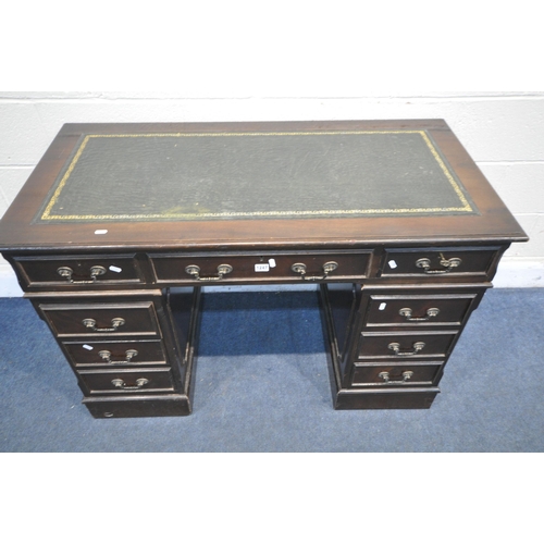 1247 - A MAHOGANY PEDESTAL DESK, with a green leather writing surface and an arrangement of 8 drawers, widt... 