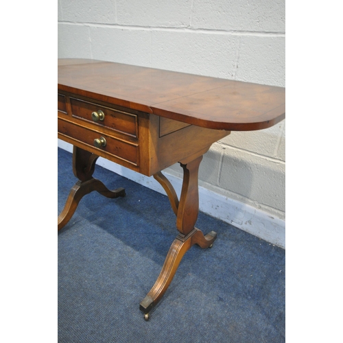 1264 - A YEW WOOD DROP LEAF SOFA TABLE, with three drawers, open width 110cm x depth 67cm x depth 46cm x he... 