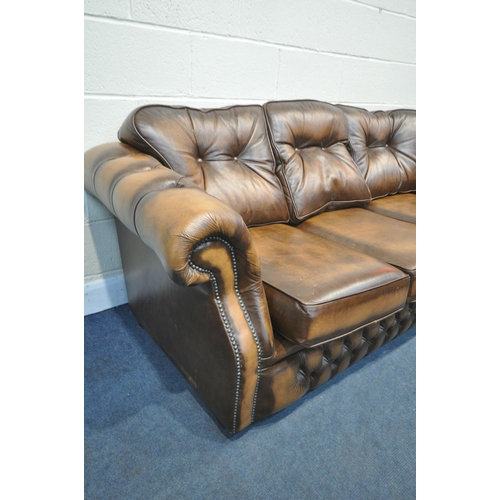 1267 - A BROWN LEATHER CHESTERFIELD SOFA, length 201cm (condition:-good condition)