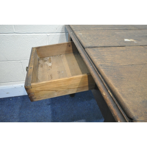 1272 - AN EARLY 20TH CENTURY OAK TABLE, with a plank top, a drawer at each end, on turned legs, length 162c... 