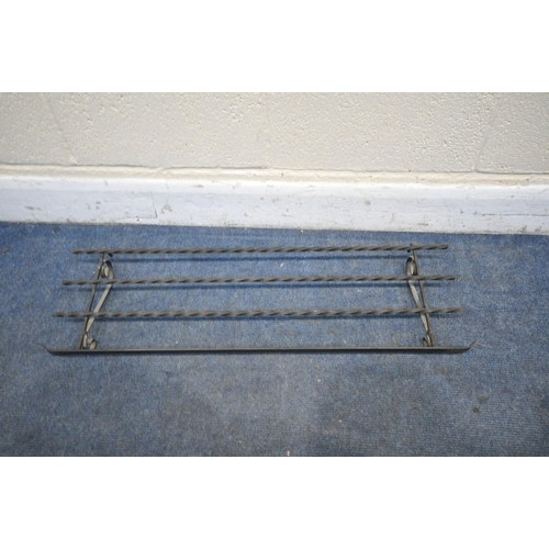 1312 - A WROUGHT IRON WALL HANGING COAT RACK, with detachable shoe shelf to top, and three wooden slats, wi... 