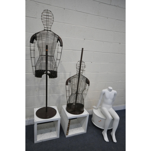 1320 - TWO WIRE FEMALE MANNEQUINS, on distressed later added bases, along with a child shop display mannequ... 