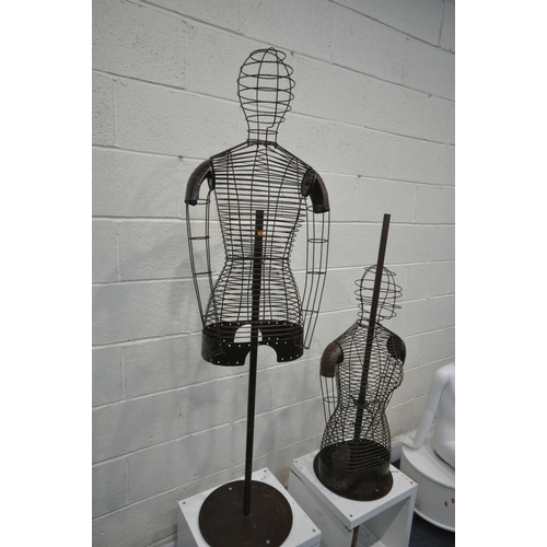 1320 - TWO WIRE FEMALE MANNEQUINS, on distressed later added bases, along with a child shop display mannequ... 