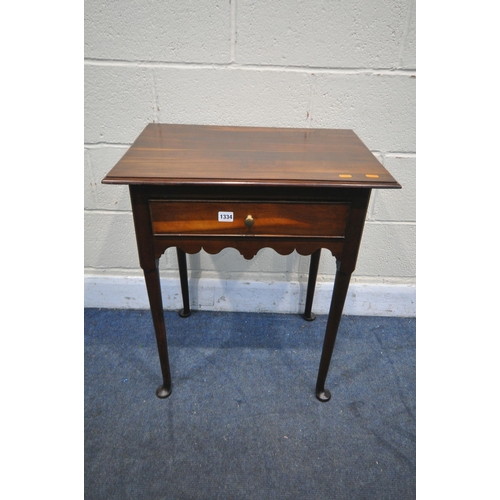 1334 - A GEORGIAN STYLE FRUIT WOOD LOWBOY, with a single draw incorporating older timbers, a wavy apron on ... 