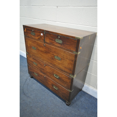 1337 - A 19TH CENTURY MAHOGANY MILITARY CAMPAIGN CHEST, with a brass banding and locks, splits into two sec... 