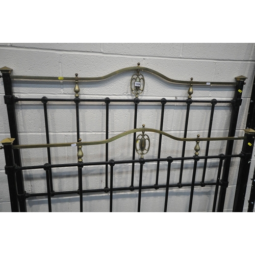 1338 - A 19TH CENTURY BRASS AND IRON 4FT 6 BEDSTEAD, with brass finials with a centred motif (condition:- m... 