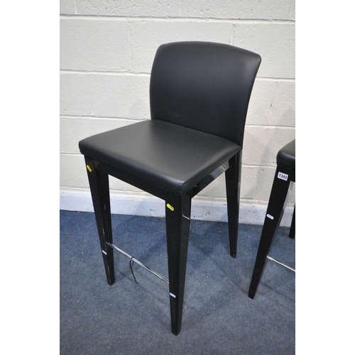 1343 - A SET OF TWO PININFARINA EBONISED BAR STOOLS, signed to back (condition:-ebonised coating lifting an... 