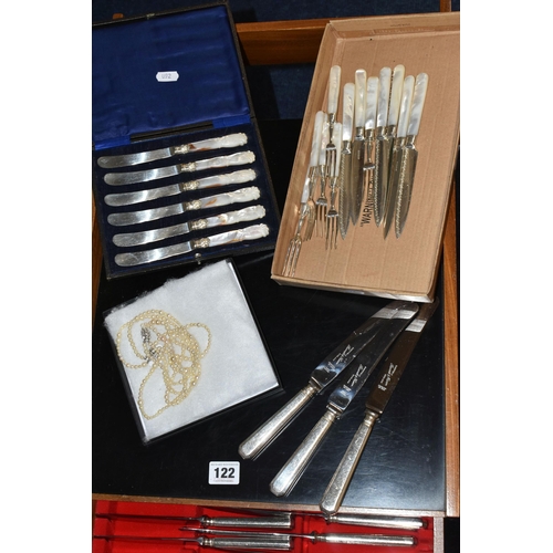 122 - A TEAK TWO DRAWER CANTEEN OF BENNETT & HERON SILVER PLATED CUTLERY, the cabinet with open area and m... 