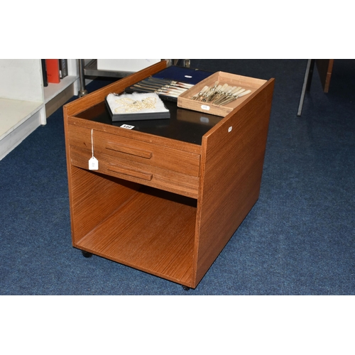 122 - A TEAK TWO DRAWER CANTEEN OF BENNETT & HERON SILVER PLATED CUTLERY, the cabinet with open area and m... 