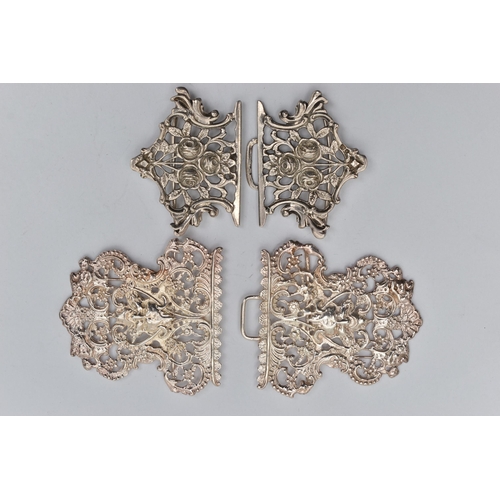 49 - TWO SILVER NURSES BELT BUCKLES, the first a large openwork floral and Bacchus buckle, hallmarked 'Wi... 