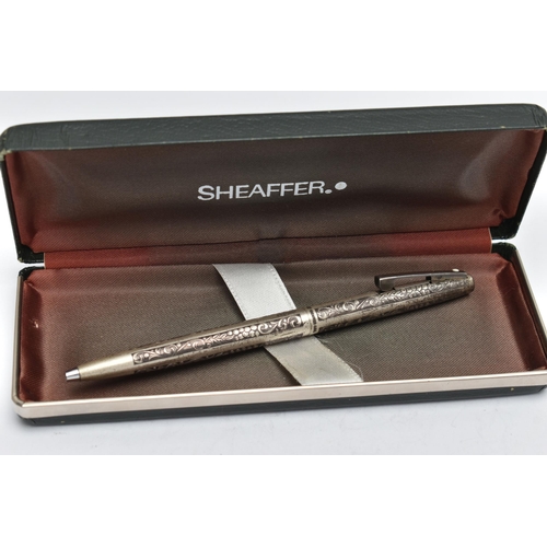 57 - A SILVER SHEAFFER PEN, ball point pen with foliage etched detail, hallmarked London import 1975, tog... 