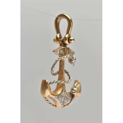 61 - A YELLOW METAL AND DIAMOND ANCHOR PENDANT, a yellow metal anchor with white metal detail, set with n... 