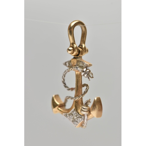 61 - A YELLOW METAL AND DIAMOND ANCHOR PENDANT, a yellow metal anchor with white metal detail, set with n... 