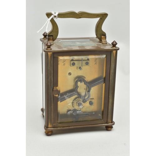 70 - A CARRIAGE CLOCK, white ceramic dial, roman numerals, steel hands (one hand is free from the dial an... 