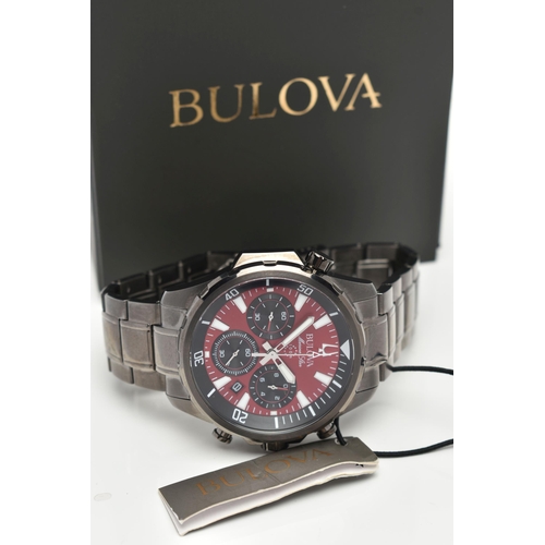 77 - A GENTS 'BULOVA' CHRONOGRAPH WRISTWATCH, quartz movement, round red dial signed 'Bulova Marine Star'... 