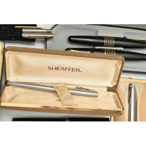 92 - A TIN OF ASSORTED PENS, to include two brushed steel 'Sheaffer' ball point pens with boxes, a boxed ... 