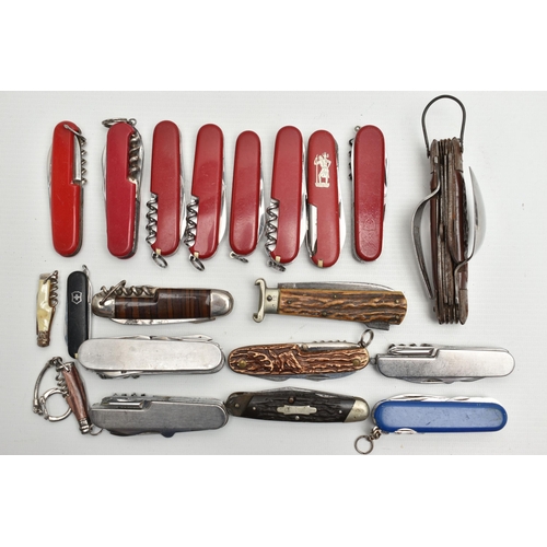 93 - AN ASSORTMENT OF SWISS ARMY KNIVES, twenty knives, predominantly 'Victorinox', (condition report: us... 