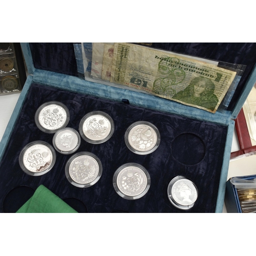 124 - A PLASTIC CASE CONTAINING COIN ALBUMS AND MIXED COINAGE TO INCLUDE:A 1992 Proof Uk and Ireland coin ... 