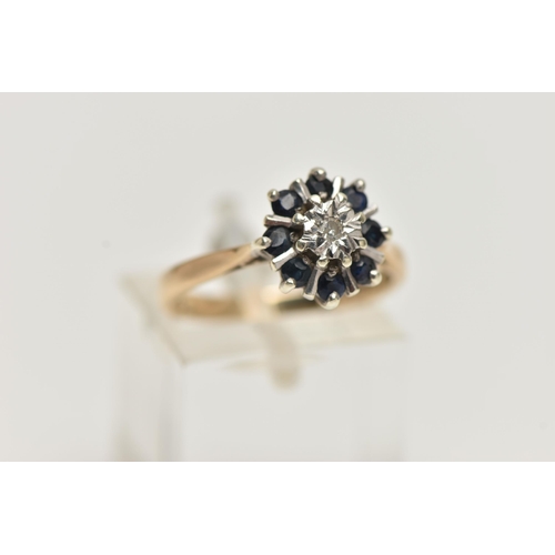 138 - A 9CT GOLD SAPPHIRE AND DIAMOND CLUSTER RING, centring on a single cut diamond illusion set, in a su... 