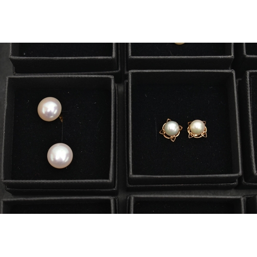 140 - A BOX OF ASSORTED EARRINGS, nine pairs in total, to include seven pairs of cultured pearl stud earri... 