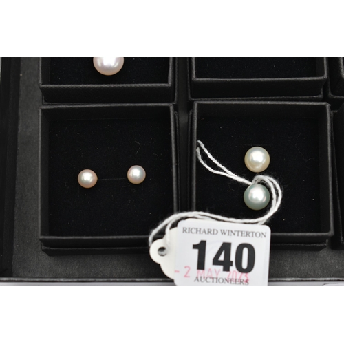 140 - A BOX OF ASSORTED EARRINGS, nine pairs in total, to include seven pairs of cultured pearl stud earri... 