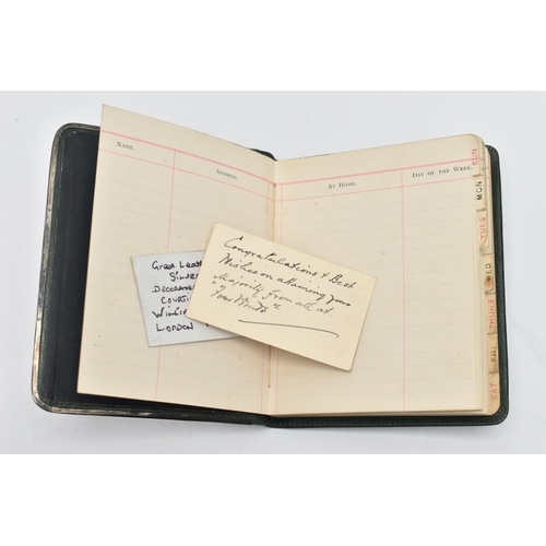 141 - A EDWARDIAN WILLIAM COMYNS & SONS SILVER MOUNTED AND GREEN LEATHER BOUND DAYS OF THE WEEK NOTEBOOK, ... 