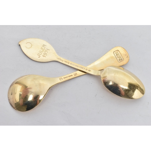 158 - TWO 1970'S DANISH SILVER GILT AND ENAMEL YEAR SPOONS BY GEORG JENSEN AND ANTON MICHELSEN, the Georg ... 