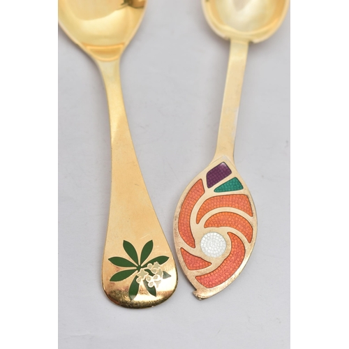 158 - TWO 1970'S DANISH SILVER GILT AND ENAMEL YEAR SPOONS BY GEORG JENSEN AND ANTON MICHELSEN, the Georg ... 