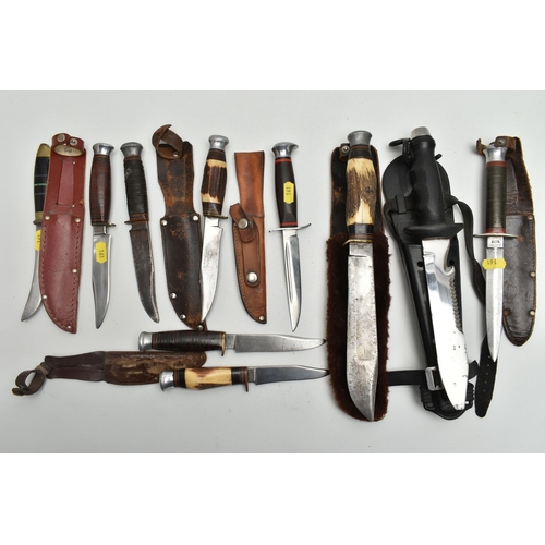 161 - SIX SHEATHED HUNTING KNIVES, THREE FURTHER HUNTING KNIVES AND A SHEATHED NEMROD DIVER'S KNIFE, the h... 