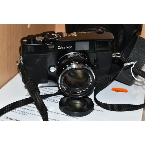 373 - A ZEISS IKON RANGEFINDER FILM CAMERA fitted with a Carl Zeiss C Sonnar 50mm F1.5 lens and soft case ... 