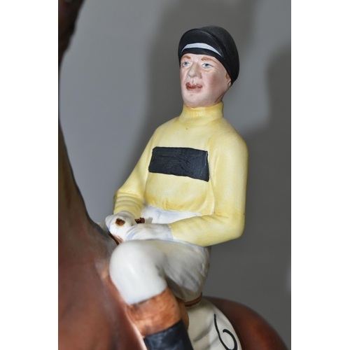 379 - A BESWICK ARKLE FIGURE, with Pat Taaffe Up, no 2084, from the Connoisseur Horses series, the horse i... 