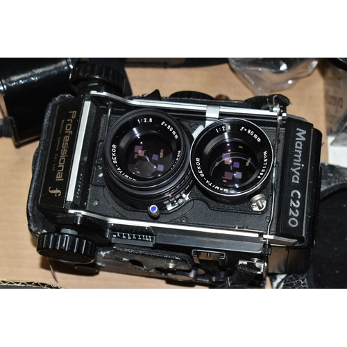 395 - A MAMIYA C220 PROFFESSIONAL F TLR CAMERA with 80mm f2.8 lenses fitted, a set of 65mm f3.5 lenses, ma... 