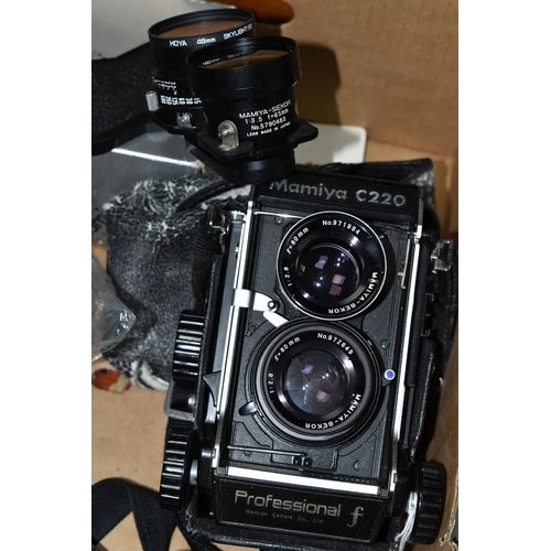 395 - A MAMIYA C220 PROFFESSIONAL F TLR CAMERA with 80mm f2.8 lenses fitted, a set of 65mm f3.5 lenses, ma... 