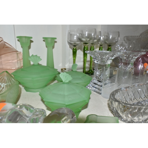 396 - A LARGE QUANTITY OF CUT CRYSTAL AND COLOURED GLASS, comprising a silverplate cruet stand with an ass... 