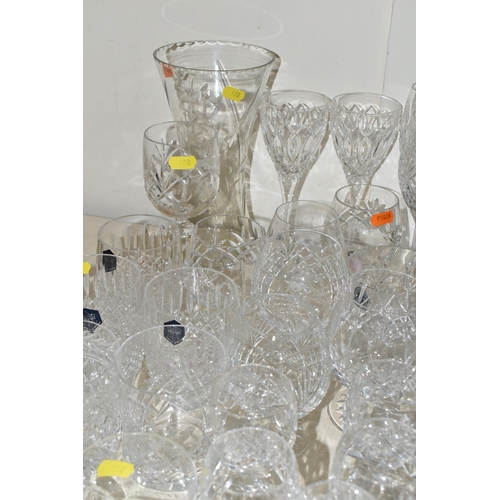 400 - A LARGE QUANTITY OF CUT CRYSTAL, comprising a pair of pink Caithness glass bud vases, a Caithness 'M... 