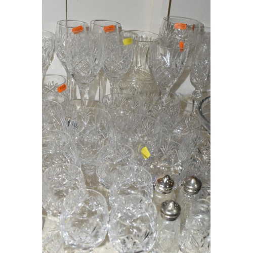 400 - A LARGE QUANTITY OF CUT CRYSTAL, comprising a pair of pink Caithness glass bud vases, a Caithness 'M... 