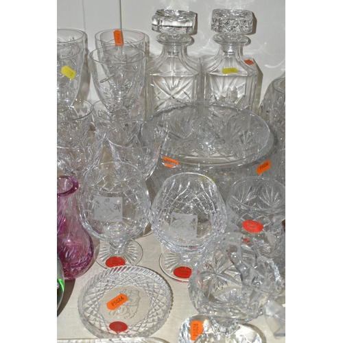 400 - A LARGE QUANTITY OF CUT CRYSTAL, comprising a pair of pink Caithness glass bud vases, a Caithness 'M... 