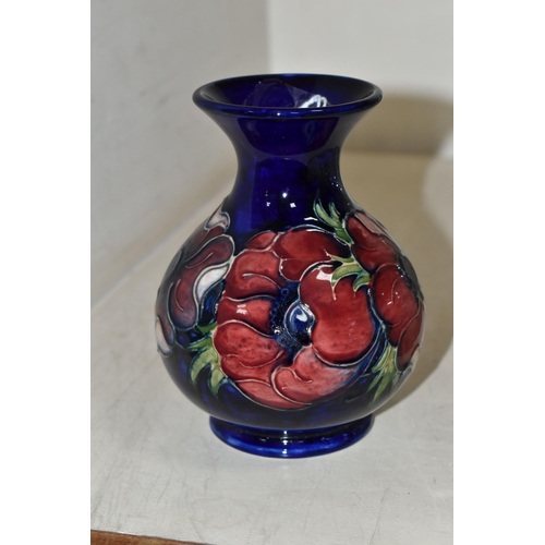 401 - A MOORCROFT ANEMONE PATTERN VASE, height 14cm, a bulbous form vase, purple and mauve anemones on a b... 