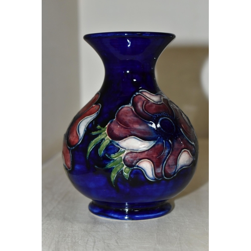 401 - A MOORCROFT ANEMONE PATTERN VASE, height 14cm, a bulbous form vase, purple and mauve anemones on a b... 