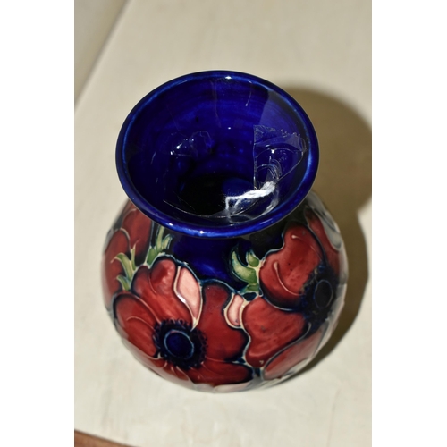 401 - A MOORCROFT ANEMONE PATTERN VASE, height 14cm, a bulbous form vase, purple and mauve anemones on a b... 