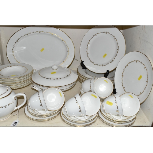 403 - A ROYAL WORCESTER 'GOLD CHANTILLY' PATTERN DINNER SET, comprising eight dinner plates, one meat plat... 