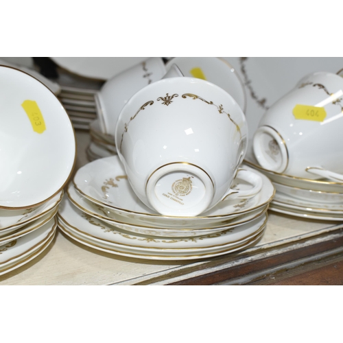 403 - A ROYAL WORCESTER 'GOLD CHANTILLY' PATTERN DINNER SET, comprising eight dinner plates, one meat plat... 